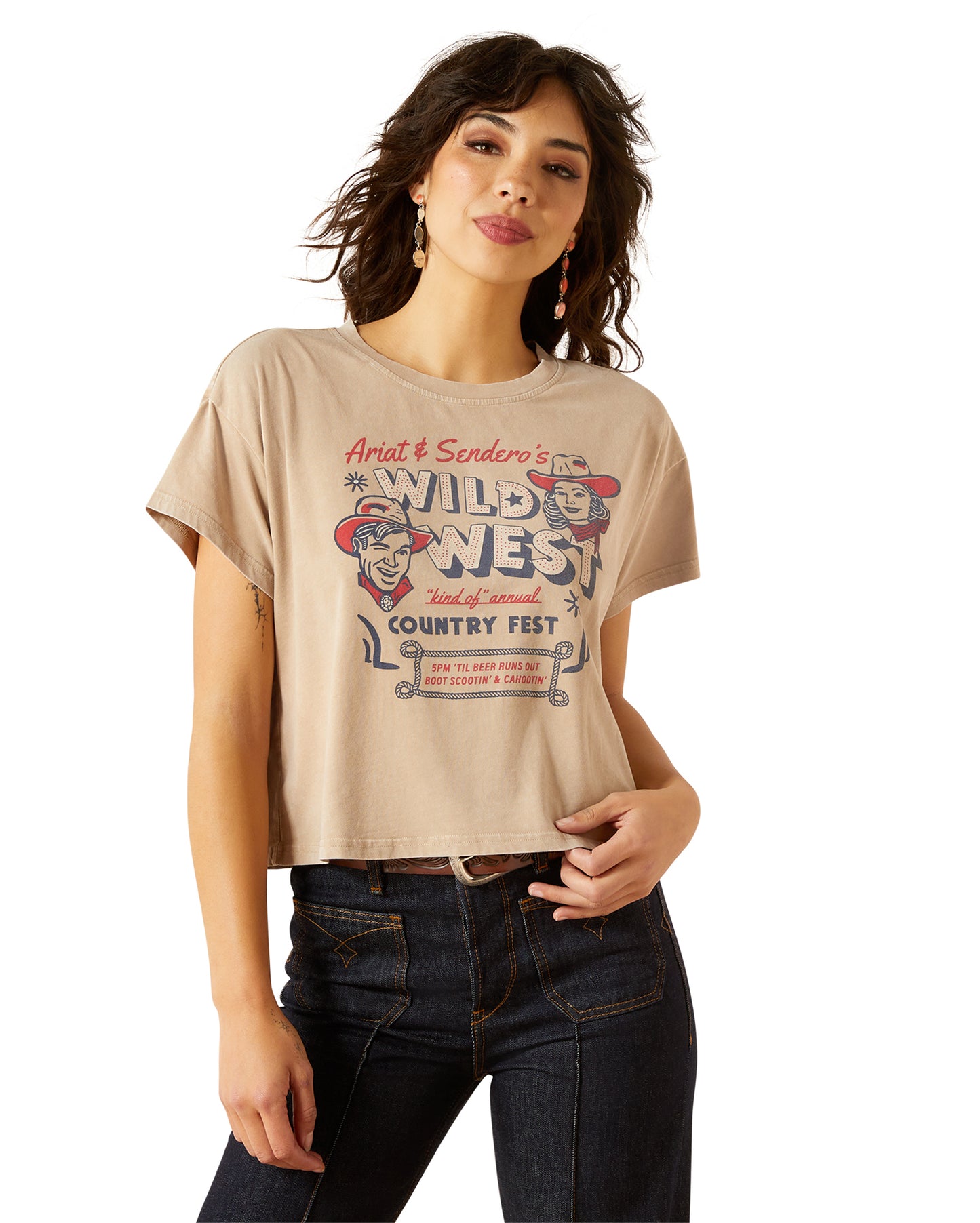 Women's Sendero X Ariat Wild West Country Fest T-Shirt - 10062912 by Ariat from Skip’s Western Outfitters | ARI-10062912-LG-SAVANNAH-TAN-MINERAL-WASH